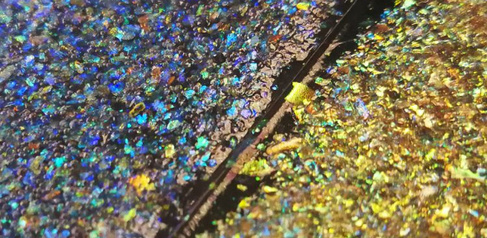 Films of cellulose nanocrystals prepared by the team can be made at scale using roll-to-roll processes like those used to make paper from wood pulp. This is the first time these materials have been fabricated at industrial scale.